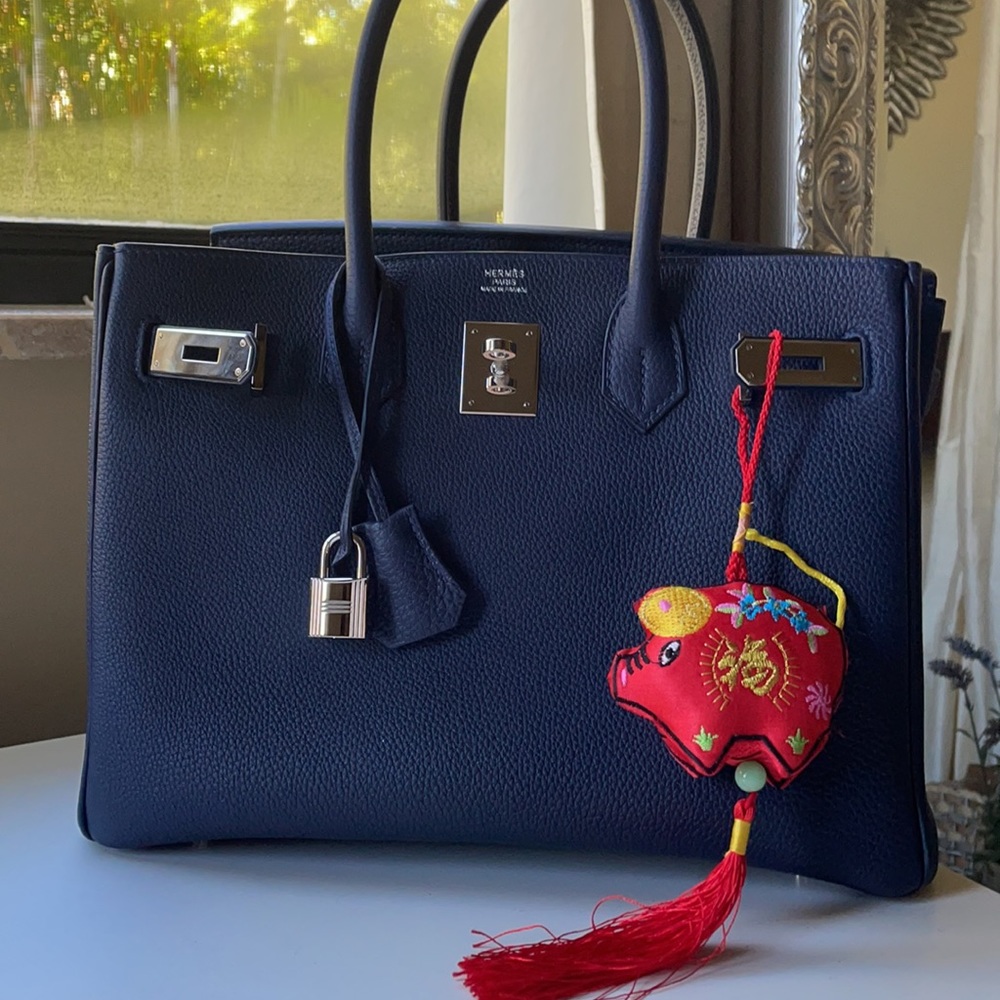 Handcrafted lucky bag charm